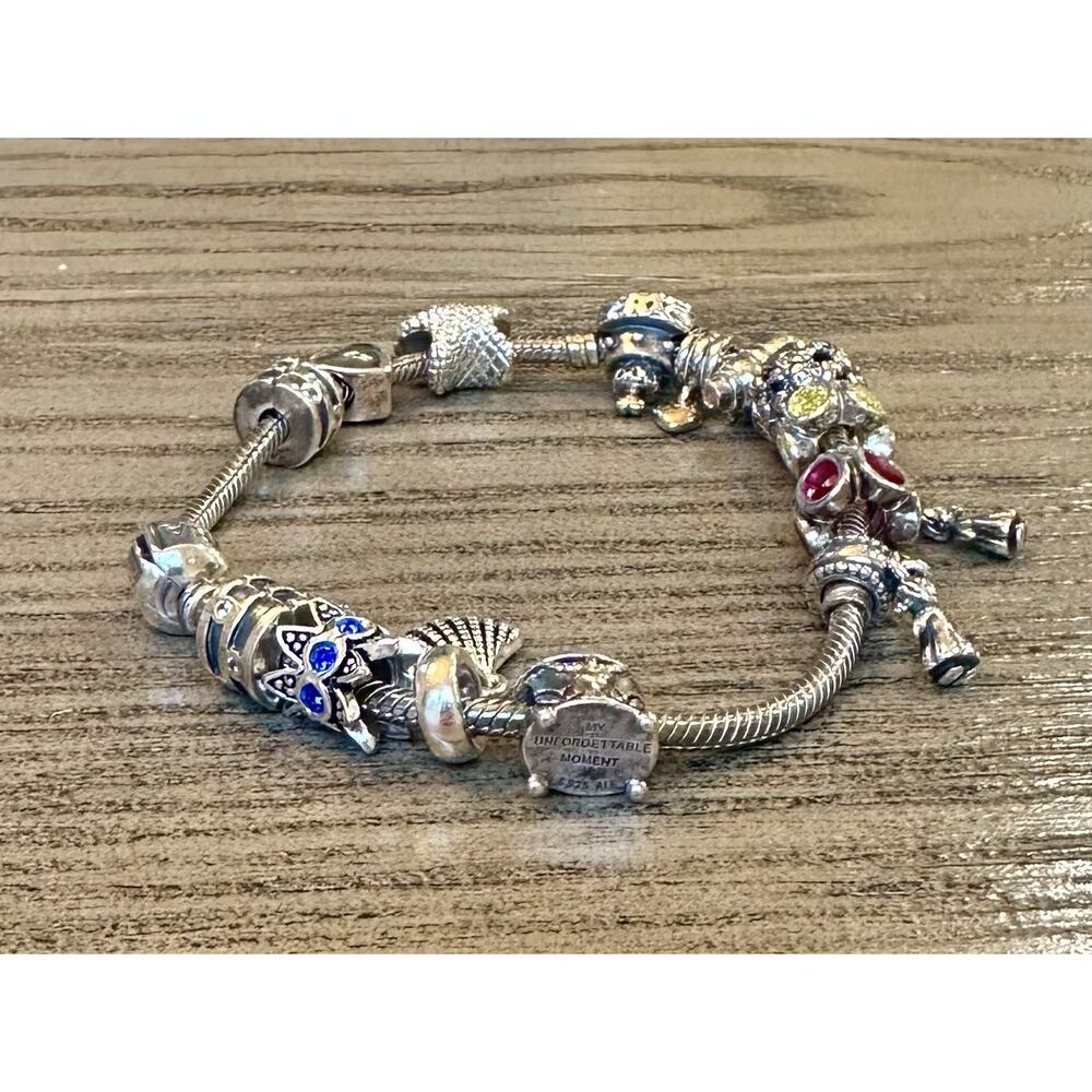 Pandora bracelet authentic pre owned Lots of Charms